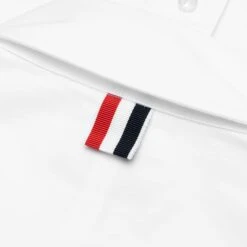 Oversized L/S Shirt W/ All Over Embroidery - White 11 Oversized L/S Shirt W/ All Over Embroidery - White -Bapejackets Shop EThom Browne Oversized Long Sleeve Shirt w All Over Embroidery White MWL381E E0317 100 06 21 23 Feature KN 6